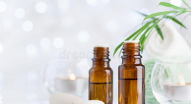 bottle-essential-oil-towel-candles-white-table-spa-aromatherapy-wellness-beauty-background-bottle-essential-oil-121257176